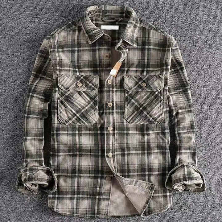 Comfortable men's plaid flannel shirt in blue and green, ideal for casual wear and fall fashion.