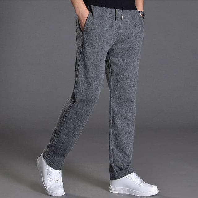 Comfortable men's relaxed fit trousers, ideal for everyday wear and casual spring outfits.