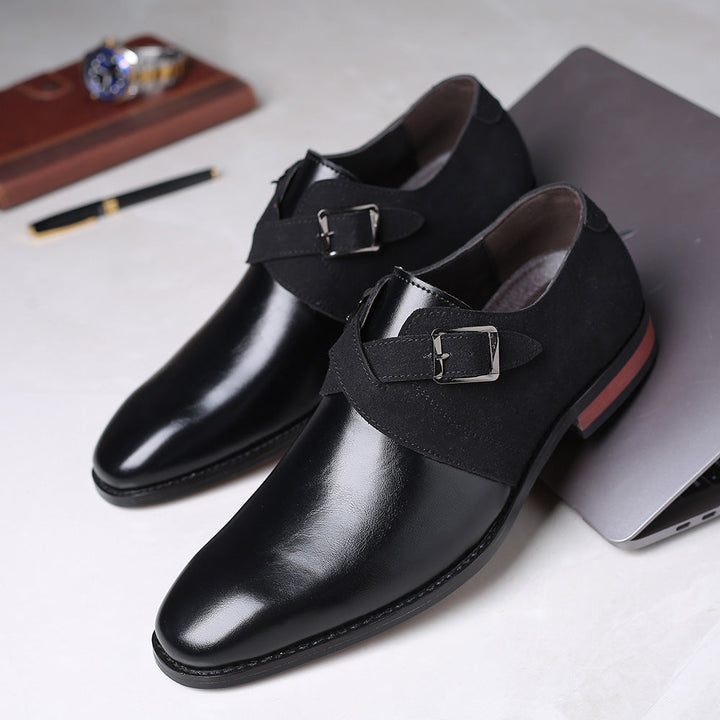 Men's opulent black leather loafers featuring a distinctive buckle design.