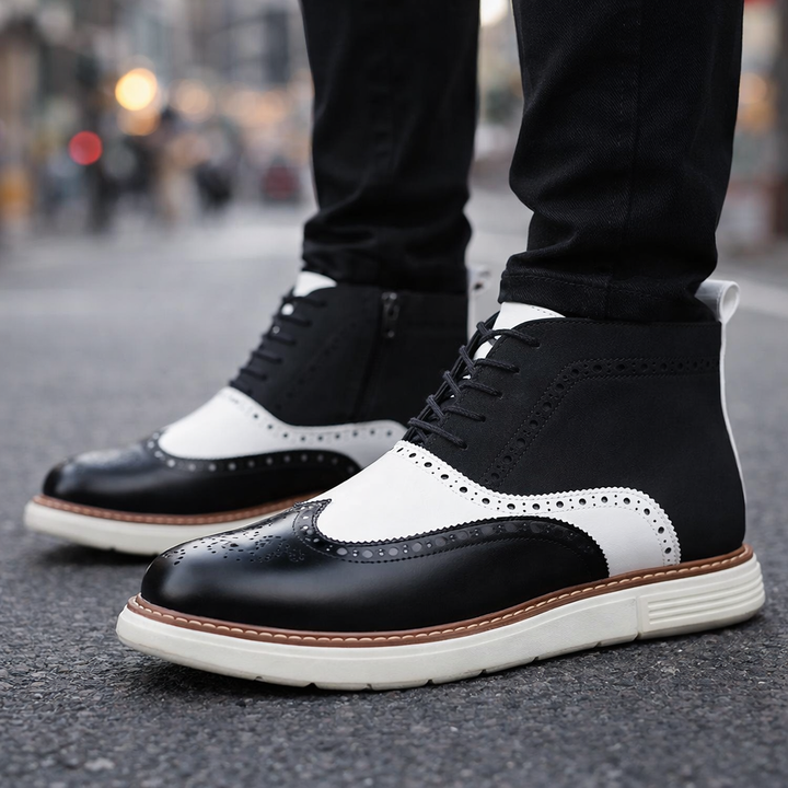 Classic men's dress boots made from premium leather, suitable for formal occasions.
