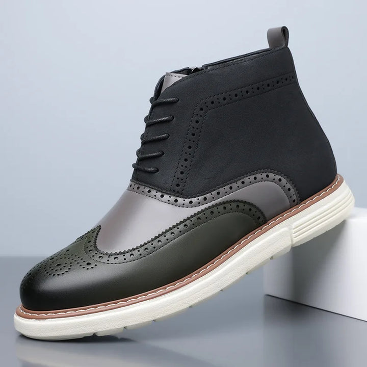 A pair of men's classic leather boots with brogue patterns, ideal for autumn fashion.