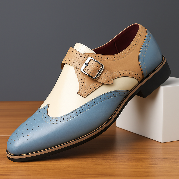 Close-up of a men's monk strap brogue shoe showing intricate wingtip design