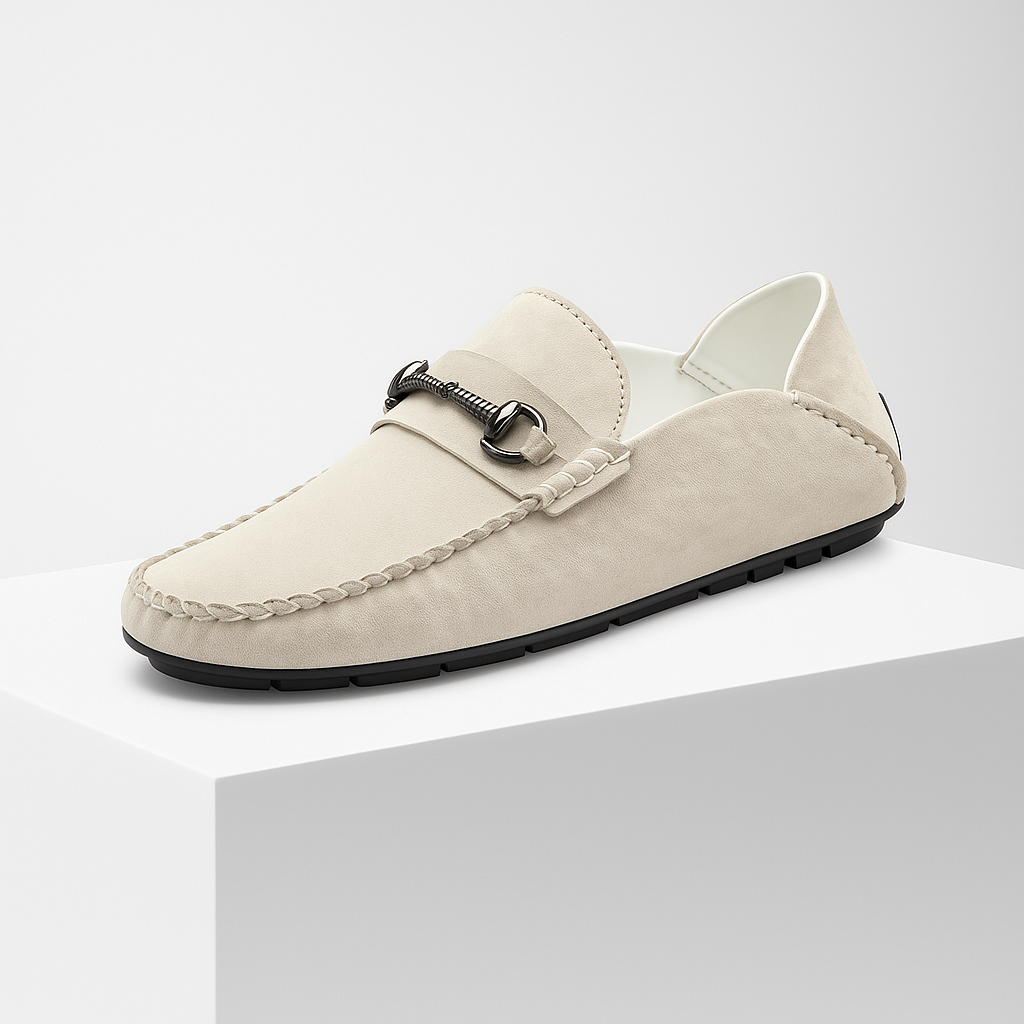 Top-down view of men's classic brown suede bit loafers, emphasizing the sleek design and texture