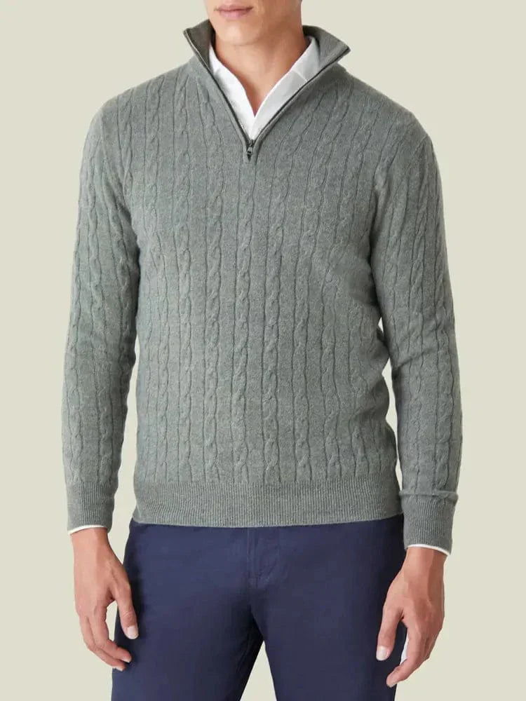 Front view of a men's fashionable cable knit half zip sweater, a staple piece for any man's spring wardrobe.