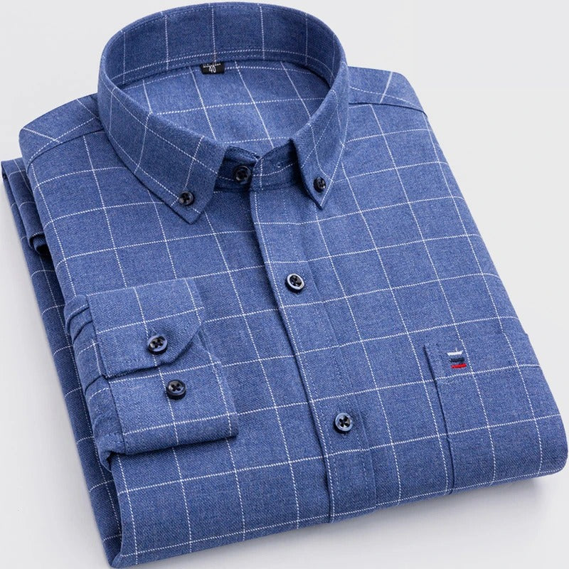 Folded men's cotton blend checkered shirt, displaying its distinct pattern and comfortable material.