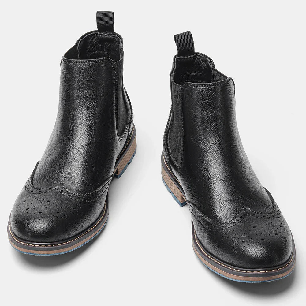 Pair of classic mens slip-on boots, ideal for versatile fashion and lasting comfort
