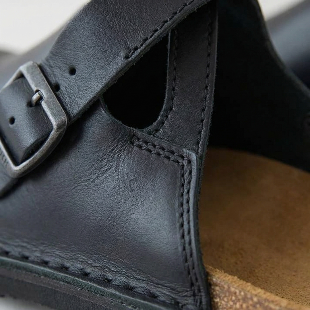 Men's versatile comfort clogs in brown, slip-on design offers easy-wear casual footwear for any occasion.