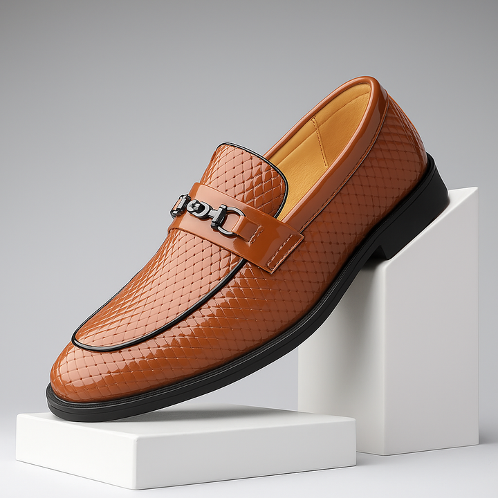Men's embossed black leather bit loafers with silver hardware, front view, for smart casual looks.