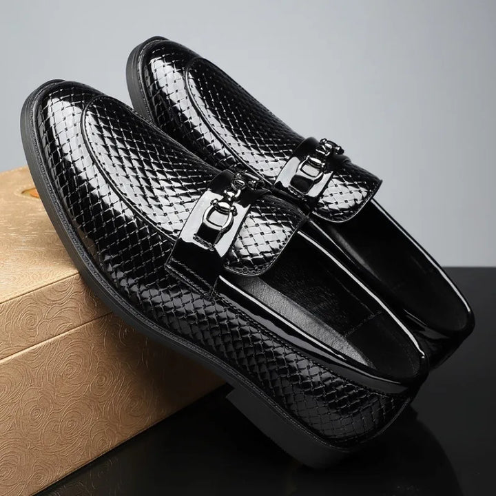 Men wearing embossed leather bit loafers with trousers, showcasing a smart casual outfit.
