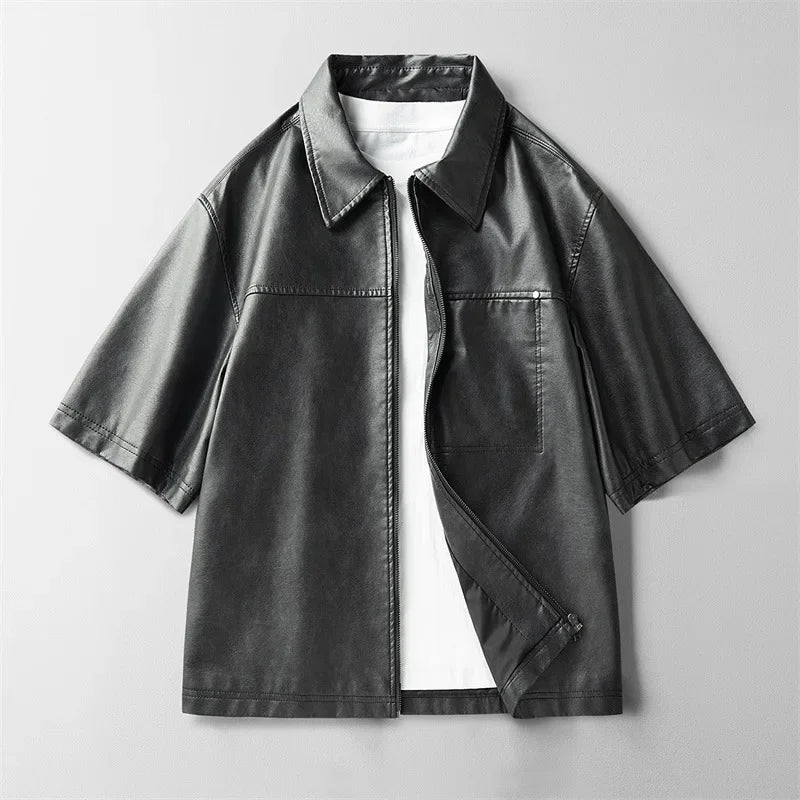 Front view of a men's coffee genuine leather short-sleeve shirt with prominent button detailing.