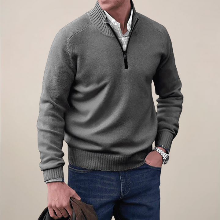 Men's half-zip knit sweater in a light color, perfect for spring casual wear.