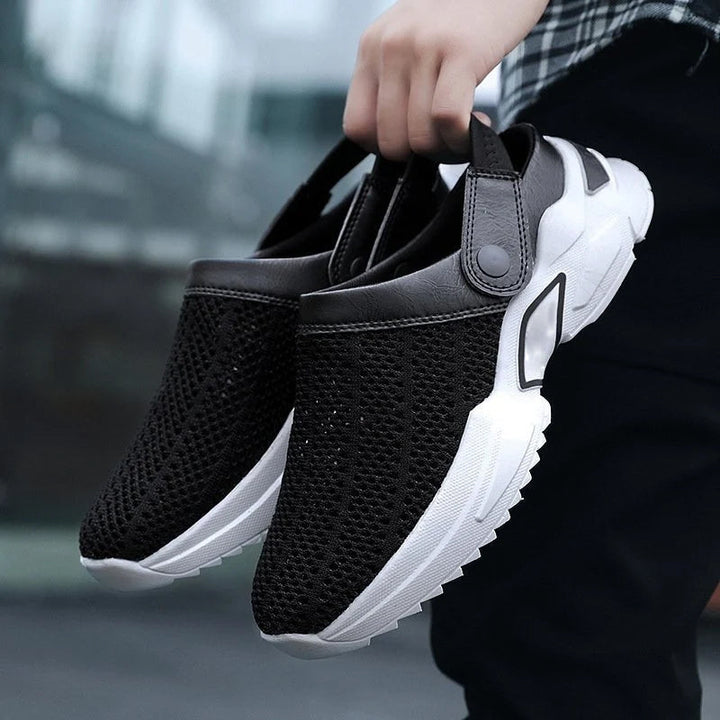 Side profile of men's comfort shoes with adjustable strap and arch support.