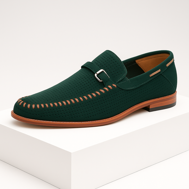 Side profile of a men's comfortable perforated suede loafer, highlighting its sleek design and quality craftsmanship.