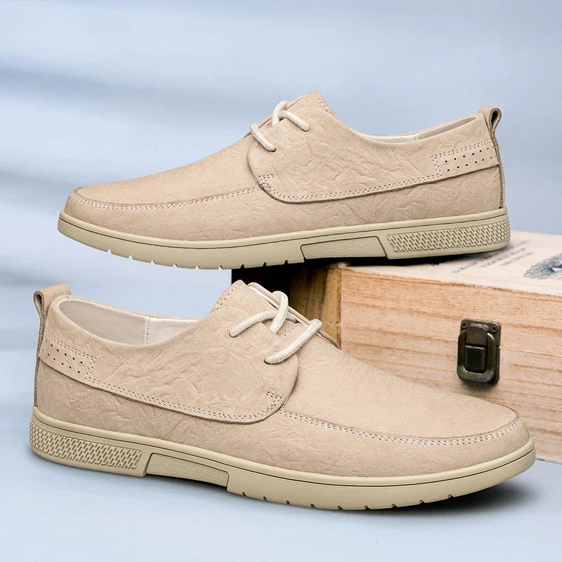 Collection of Premium Men's Leather Loafers in shades of khaki, brown, and beige, slip-on style