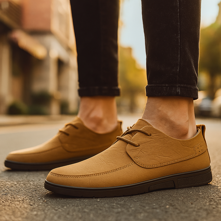 Detail of the stitching on a Men's Brown Leather Loafer, emphasizing premium quality footwear