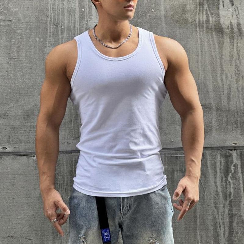 Model wearing a men's white sleeveless tank top, showcasing athletic fit and casual style.
