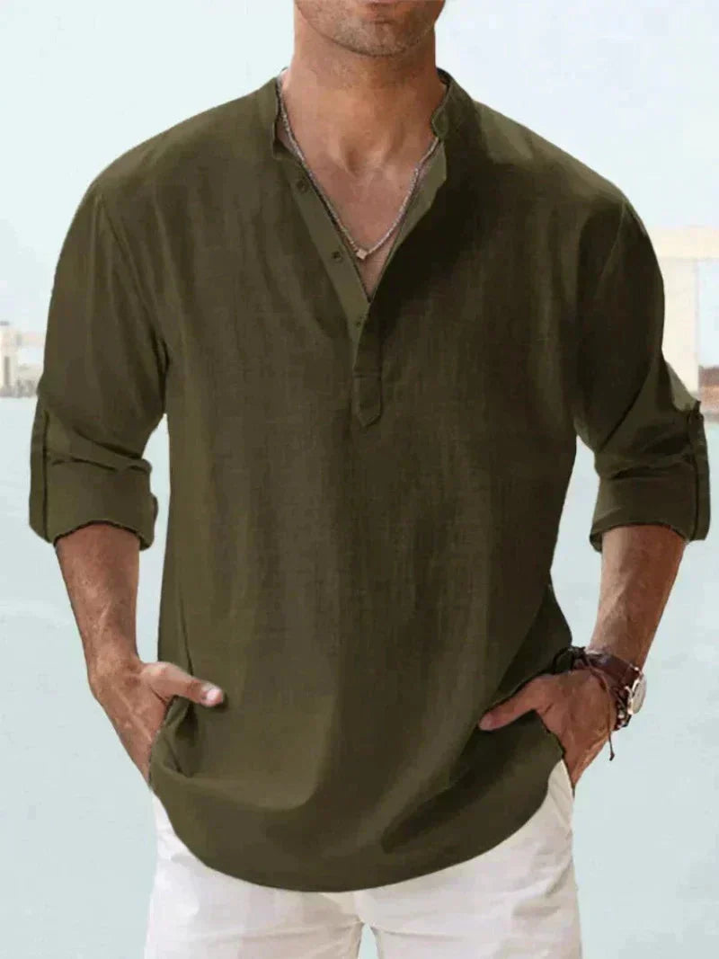 Relaxed fit men's button-down summer shirt. Casual long sleeve, easy care for warm weather & beach vacation.