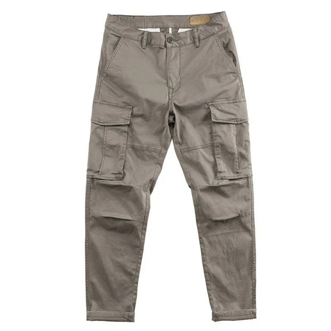 Durable men's cargo pants, cotton blend, relaxed fit with numerous pockets, perfect for utility and outdoor.