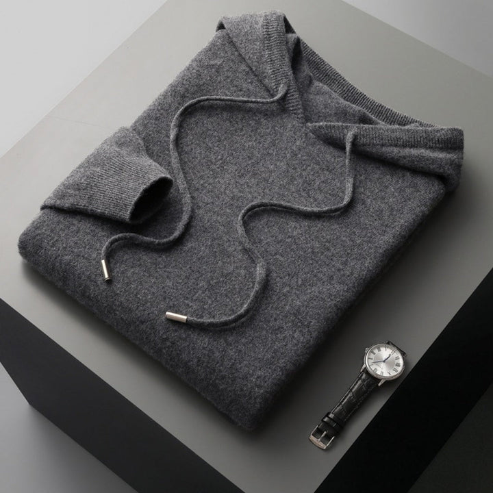 Close-up of the soft knit texture on a men's hooded pullover, highlighting quality and comfort