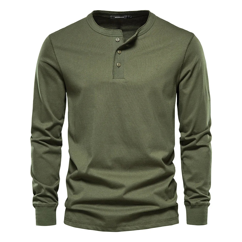 Model wearing a men's stylish long sleeve henley shirt, demonstrating its casual fit and everyday wearability