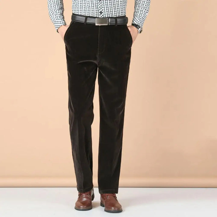 Luxurious black velvet dress pants for men, showcasing a tailored fit and premium fabric.