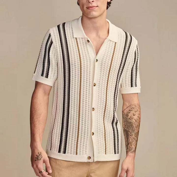 Detailed shot of the textured fabric on a men's casual button-up knit shirt, highlighting its quality
