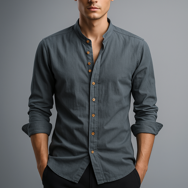 Close-up of the band collar on a men's white cotton-linen shirt, button-down detail