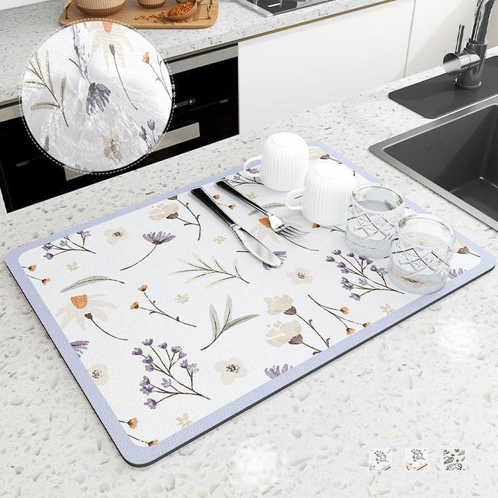 Quick-dry diatomaceous earth kitchen drying mat for countertops, absorbent and easy to clean.