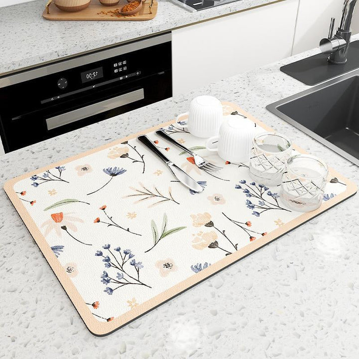 Easy-clean diatomaceous earth kitchen mat, perfect for a tidy, absorbent countertop.