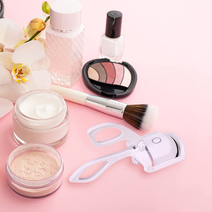 Packaging of the electric heated eyelash curler, highlighting key features for an enhanced lash lift