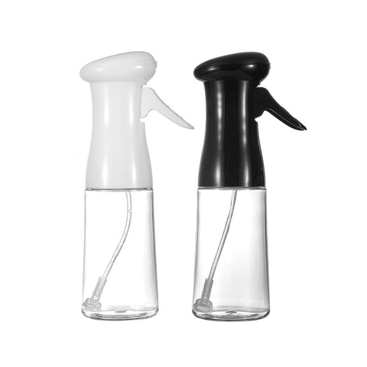 Lifestyle shot of Kitchen Oil Sprayer enhancing a healthy meal, perfect for gadget lovers