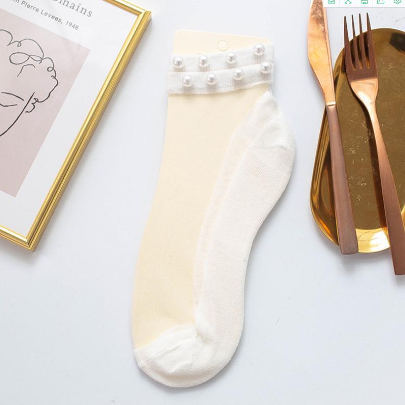 Unique fishnet ankle socks for women, featuring elegant pearl detailing.