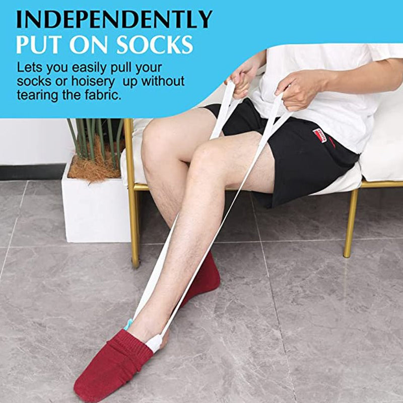 Person demonstrating use of sock aid, pulling a white sock over the adaptive dressing tool