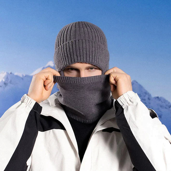 Child wearing a red fleece-lined knit beanie and scarf, perfect for winter outdoor play
