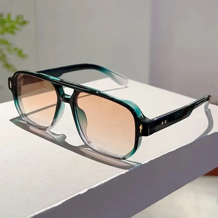 Detail of the hinge on unisex bold rectangular UV400 sunglasses, quality eyewear
