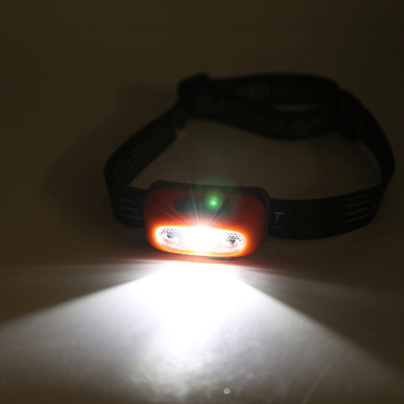 Unisex outdoor LED headlamp, featuring motion sensor activation and long-lasting rechargeable battery.