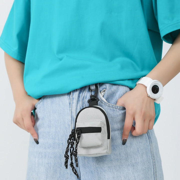 Compact and functional pendant bag, ideal for keeping essentials close.