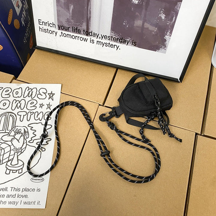 Hands-free mini pendant bag, great for carrying small essentials on the go.