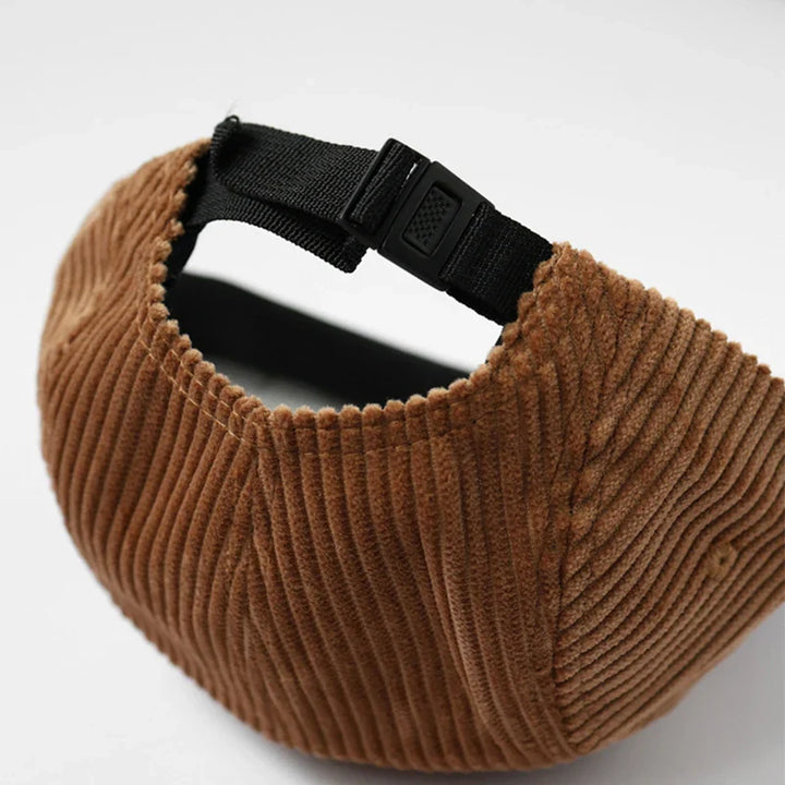 Close-up of a comfortable unisex corduroy baseball cap, highlighting its texture and quality.
