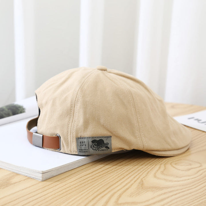 Chic unisex retro cotton beret hat, a timeless accessory that adds flair to any attire.