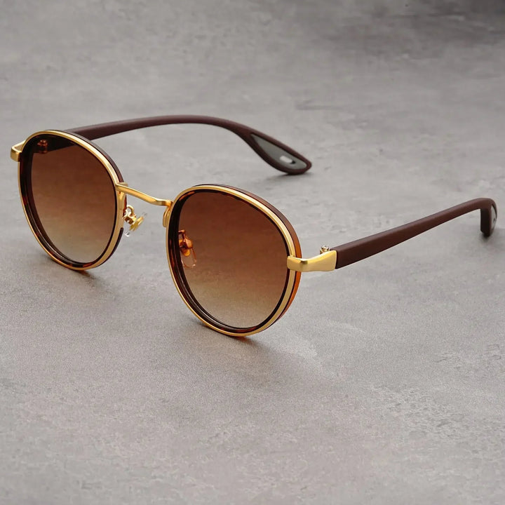 Unisex eyewear: retro round metal sunglasses with a shiny finish and gradient lenses