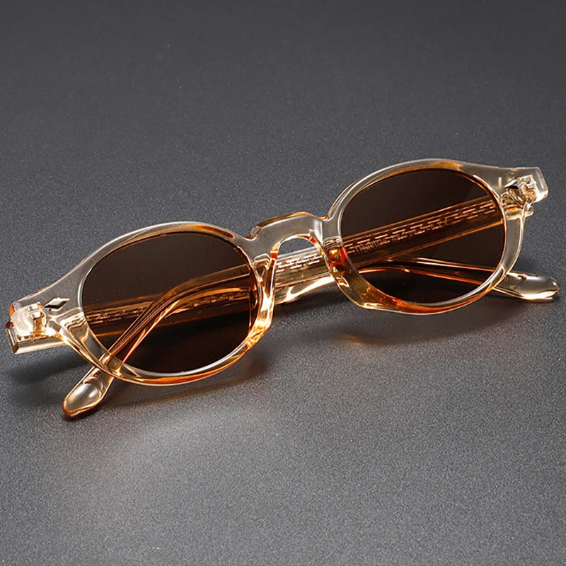 Close-up of unisex vintage round sunglasses featuring a stylish leopard print.