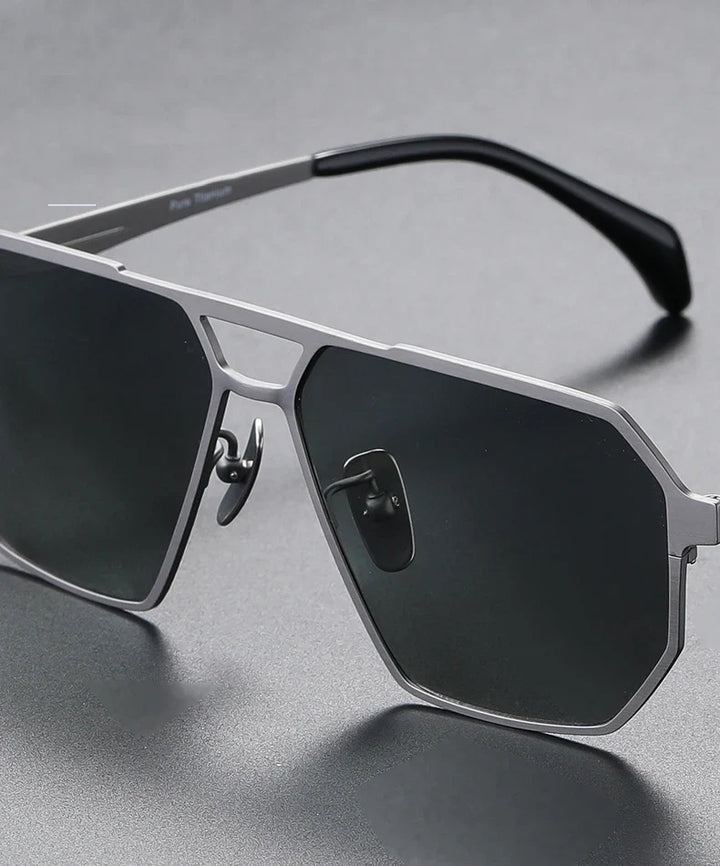 Close-up of titanium frame detail on unisex polarized sunglasses, highlighting lightweight and modern design