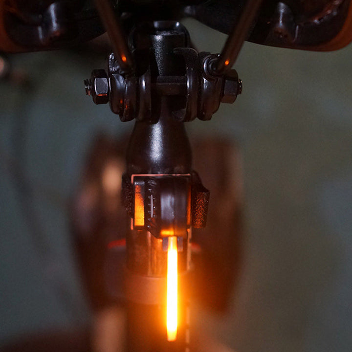 Weather-resistant USB bike taillight, provides reliable rear illumination, safety gear