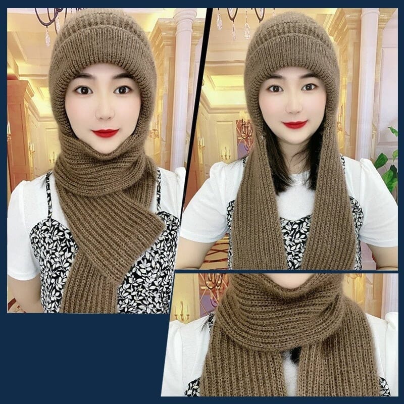Person wearing a versatile gray unisex knit hooded scarf with ear protection, suitable for various winter sports.