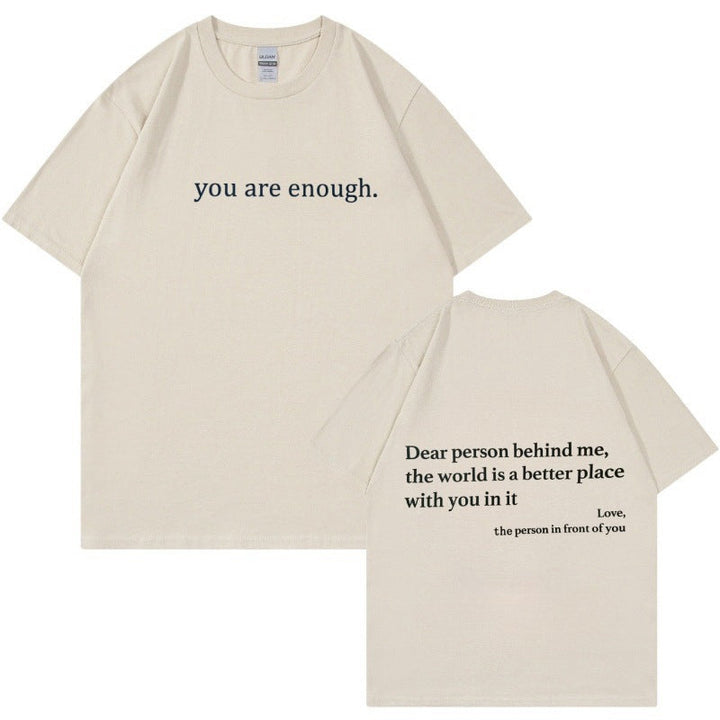 Arrangement of the 'You Are Enough' t-shirt with accessories, emphasizing casual style.