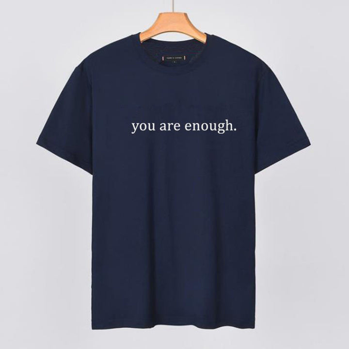 Side view of the 'You Are Enough' tee, showing the cut of this comfort wear shirt.