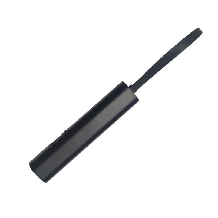 Universal 3-in-1 charging cable plugged into a power bank, ready to charge various electronics.