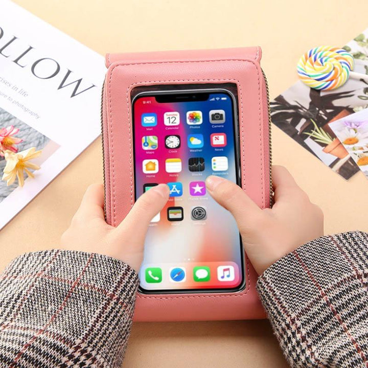 Universal crossbody phone case with adjustable strap, black PU leather; holds phone, cards, cash. Hands-free travel accessory.