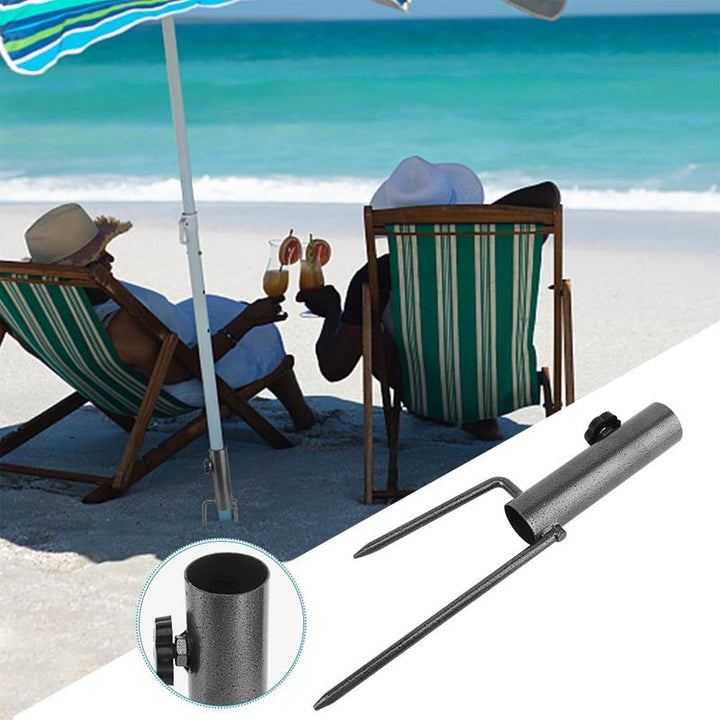 Universal Ground Anchor Umbrella Holder securely holding a beach parasol on a sandy beach.